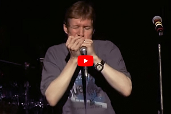 Paul Jones Playing the Harmonica